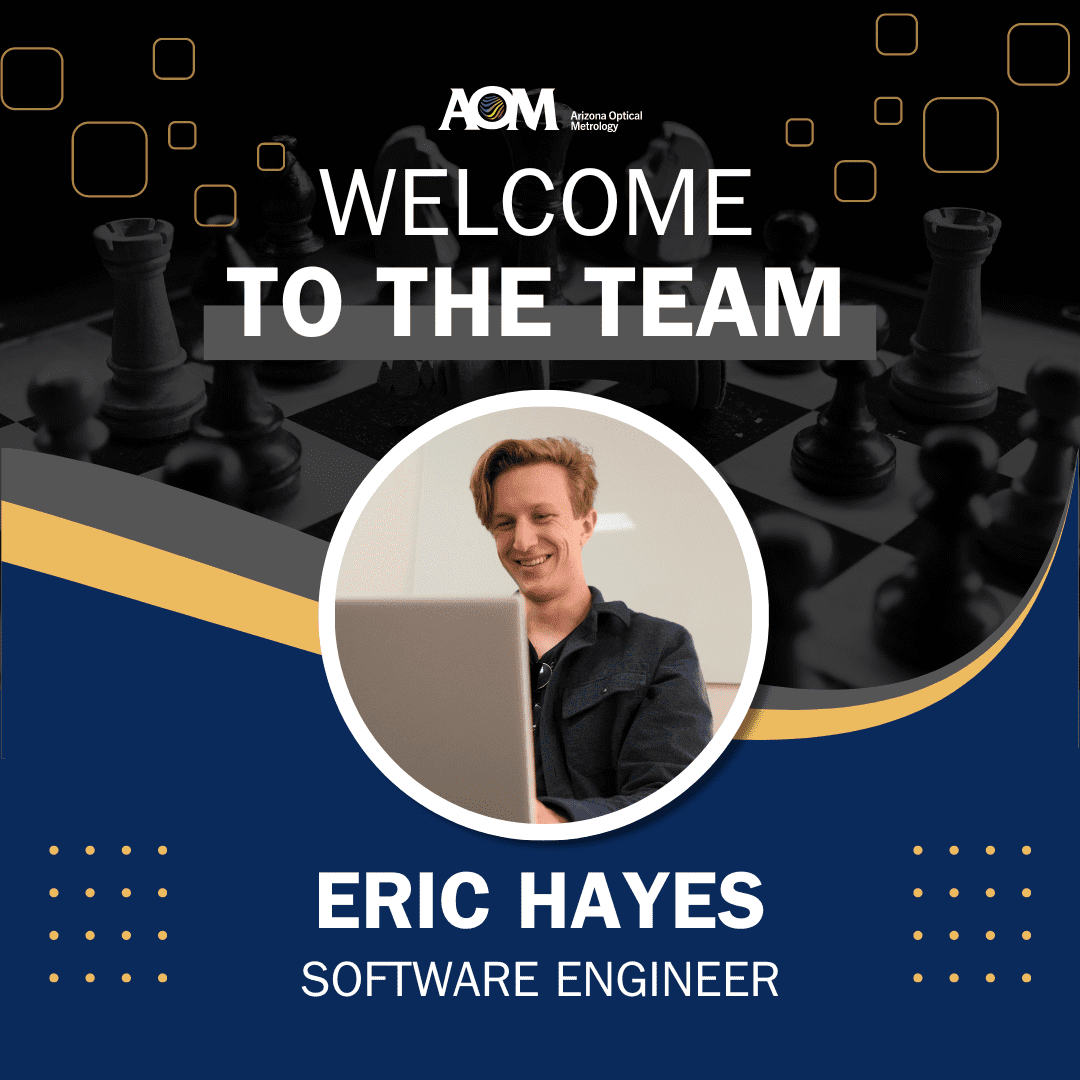 Welcome to the Team – Eric Hayes Eric Hayes smiles behind his laptop screen in an image atop a chess board background that says "Welcome to the team"